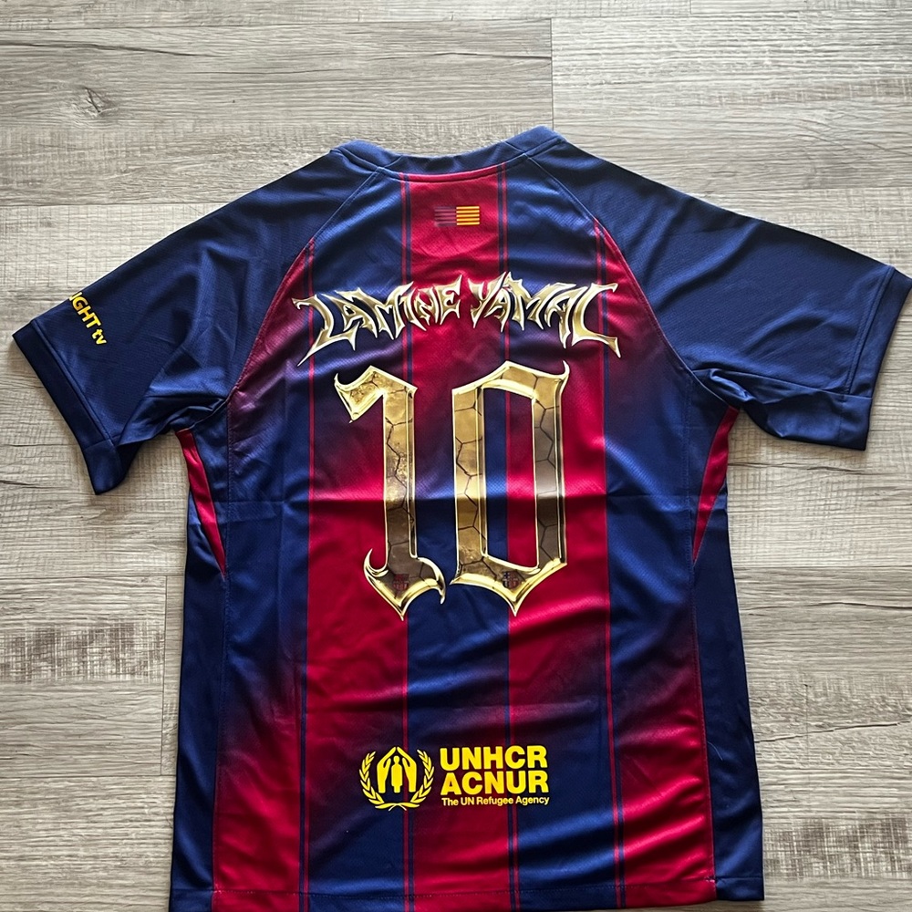 Blue and Red Soccer Jersey with Gold Accents